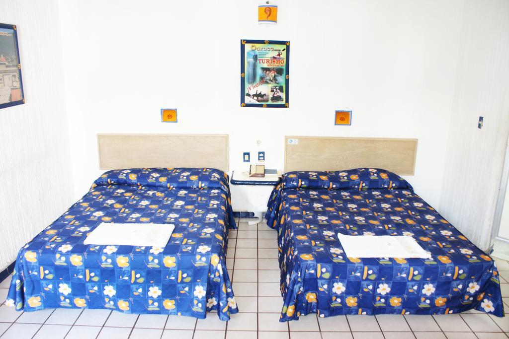 Hotel Plaza Conejo Huatulco Rom bilde